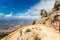 Steep dangerous mountain road with a big gravel in the mountains of Sardinia, Italy