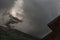 Steep edges of the Eiger wall shrouded in fog and mist