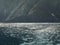 Steep Glacially Polished Cliffs  And Icy Water At Tracy Arm, Alaska