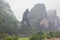 Steep hills rising up from the shores of the Li River