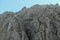 A steep mountain wall on the way to Grimming in Austrian Alps. Dangerous climbing only for professionals.