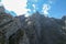 A steep mountain wall on the way to Grimming in Austrian Alps. Dangerous climbing only for professionals.