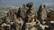 Steep rock chimneys with mysterious entrances