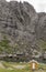 Steep rock crags on fjord waters, at Nusfjord, Lofoten, Norway