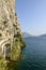 Steep rock walls on lakeside, near Limone, Italy