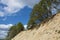 Steep sandy cliff on the Klyazma River in the Ivanovo region