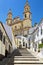 Steep village street leading to the Church (Parish of Our Lady of the Incarnation), Olvera, Cadiz Province, Andalusia, Spain, West