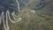 steep winding road leading along a mountain pass