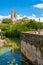 Steeples of the Saint-Andre church and view of Niort from the quay of Sevre Niortaise river in France