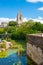 Steeples of the Saint-Andre church and view of Niort from the quay of Sevre Niortaise river in France