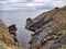 Steeply inclined, fractured rock strata on the Ness of Sound, Shetland, UK - Lerwick Sandstone Formation - Sedimentary Bedrock