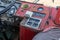 Steering wheel and a dashboard of an old school bus, public passenger bus interior