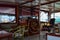 Steering wheel and engine controls on the ship bridge of a pleasure craft