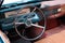 Steering wheel, interior and dashboard of vintage car cockpit