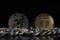 Stellar Lumens XLM And Tether USDT Crypto coins placed on silver chain in the black background.