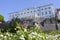 Stenbock House- building of Estonian government. Tallinn. The blossoming lilac in the foreground