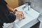 Step number one to staying healthy Put your hygiene first. an unrecognisable man washing his hands in the bathroom sink.