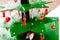 Step by step instruction how to make Christmas tree. Closeup of decorated Christmas toys made from baby macaroni in the shape of
