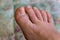 Step-by-step pedicure at home. Pedicure at home, soaking your feet in a special foot massage bath. Photo of a senior women\'s feet