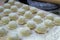 Step-by-step process of making homemade dumplings, ravioli or dumplings.