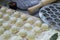 Step-by-step process of making homemade dumplings, ravioli or dumplings