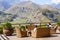 STEPANTSMINDA, GEORGIA - september 15, 2018: people eat and relax on terrace Rooms Hotel Kazbegi of the high mountain