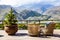 STEPANTSMINDA, GEORGIA - september 15, 2018: people eat and relax on terrace Rooms Hotel Kazbegi of the high mountain