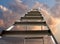 Stepladder against sky with clouds, low angle view