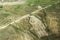 steppe landscape ravines roads from the height of a drone flight background backdrop