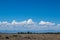 Steppe landscapes of Kazakhstan. Sky with clouds over the mountains