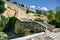 Stepped stone bridge over the Huecar river. In the background the old walls of the city of Cuenca, Spain. Built in Muslim times