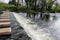 Stepping Stones Made of Concrete Over a River.