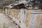 The steps of the amphitheater. Stone limestone and marble. Ancient antique amphitheater in city of Hierapolis in Turkey