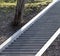 Steps of a granite ladder rising upwards