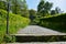 Steps with hedges in a park leading up to the Marienberg castle