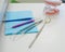 Sterile instruments are in the dentist`s office. A mirror, tweezers, a probe and a jaw layout are on the orthodontist`s