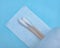 Sterile Long Cotton Tipped Applicators on blue