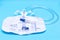 Sterile Urinary Drainage Bag with Anti-Reflux Tower isolated on blue background