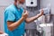 Sterility, cleanliness concept. male doctor washing hands after operation