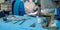 Sterilized surgical instruments on a blue table in the operating room.