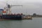 The Stern of a Container Ship berthed at the port of Conakry in Guinea