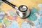 Stethoscope on Asia world globe map background