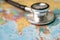 Stethoscope on Asia world globe map background