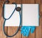 Stethoscope, blank page notepad and gloves on the doctor table. Medical diagnosis or doctor prescription mockup