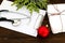 Stethoscope, blank sheet on clipboard on wooden background