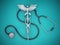 Stethoscope and caduceus icon forming dollar shape. 3D illustration