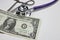 Stethoscope dollar , expenditure on health or financial assistance,