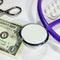 Stethoscope dollar , expenditure on health or financial assistance