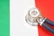 Stethoscope on the flag of Italy. economics concept