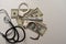 Stethoscope, handcuffs and money on gray background.